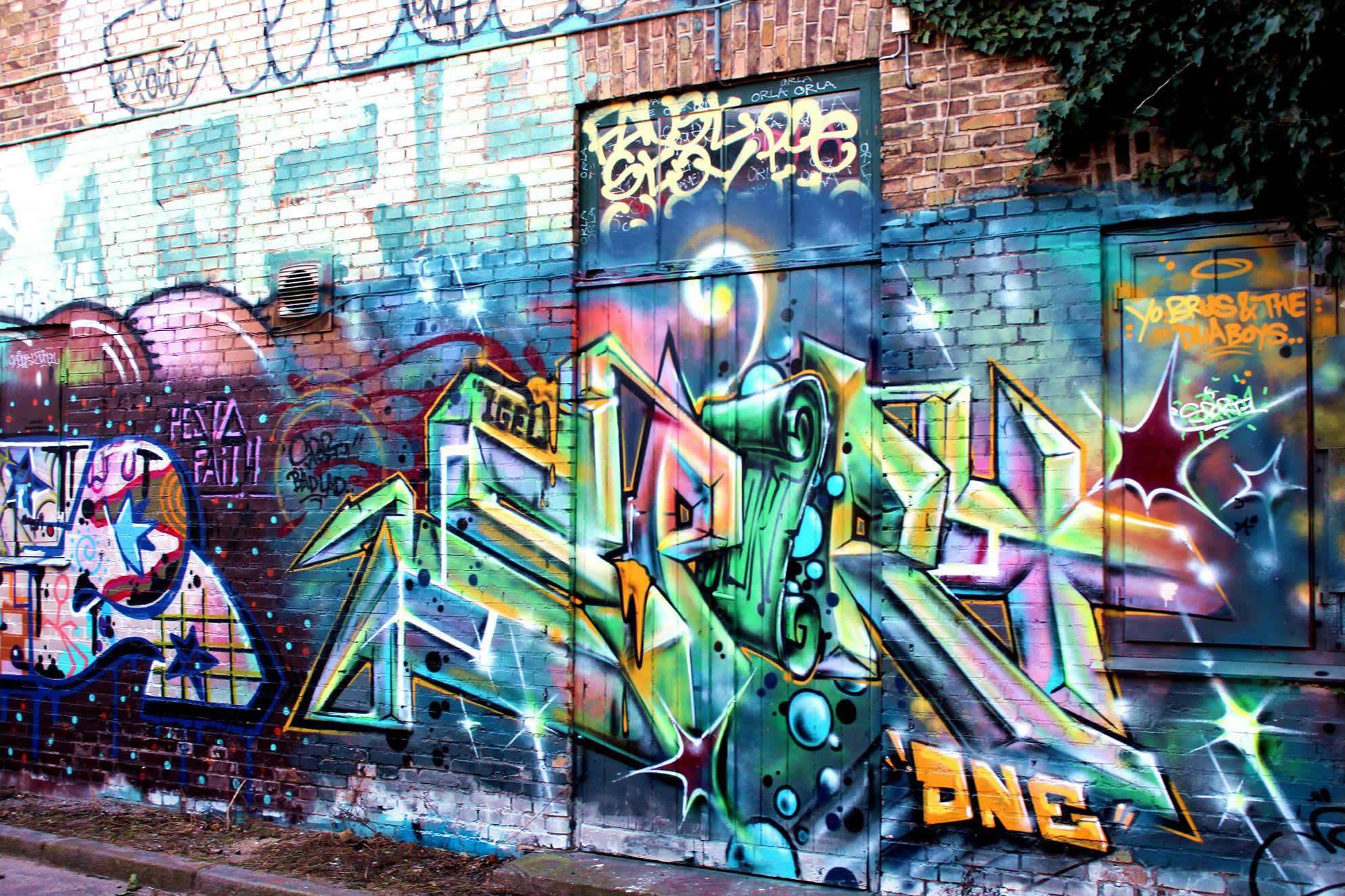 Some graffiti on a wall.